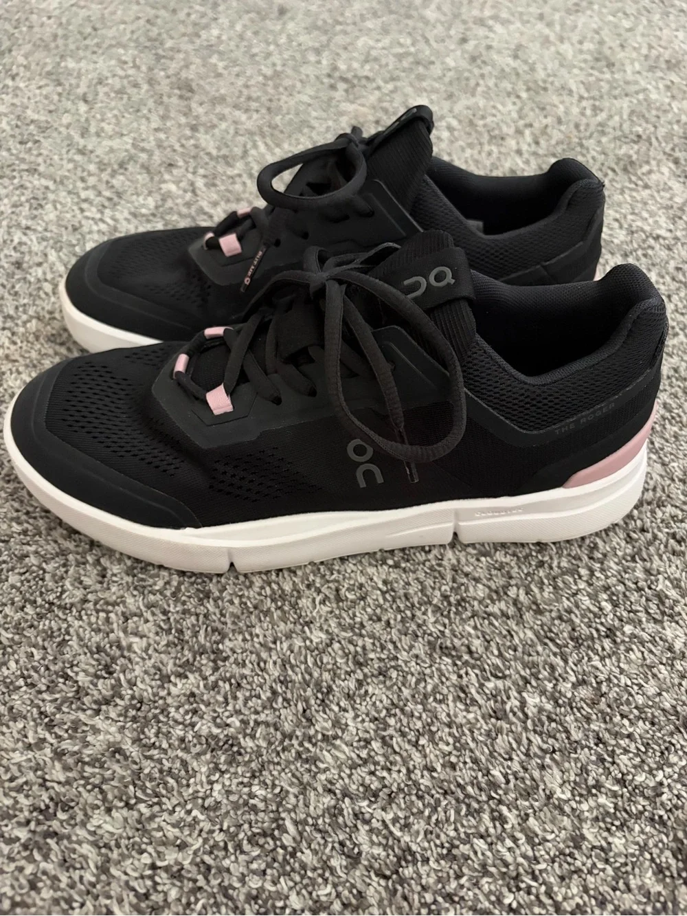 On Running Roger Women’s Black Sneakers with Pink Accents and White Sole